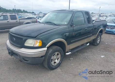 2002 Ford F150 из США, поврежденный, VIN 1FTRX18W02KA29930